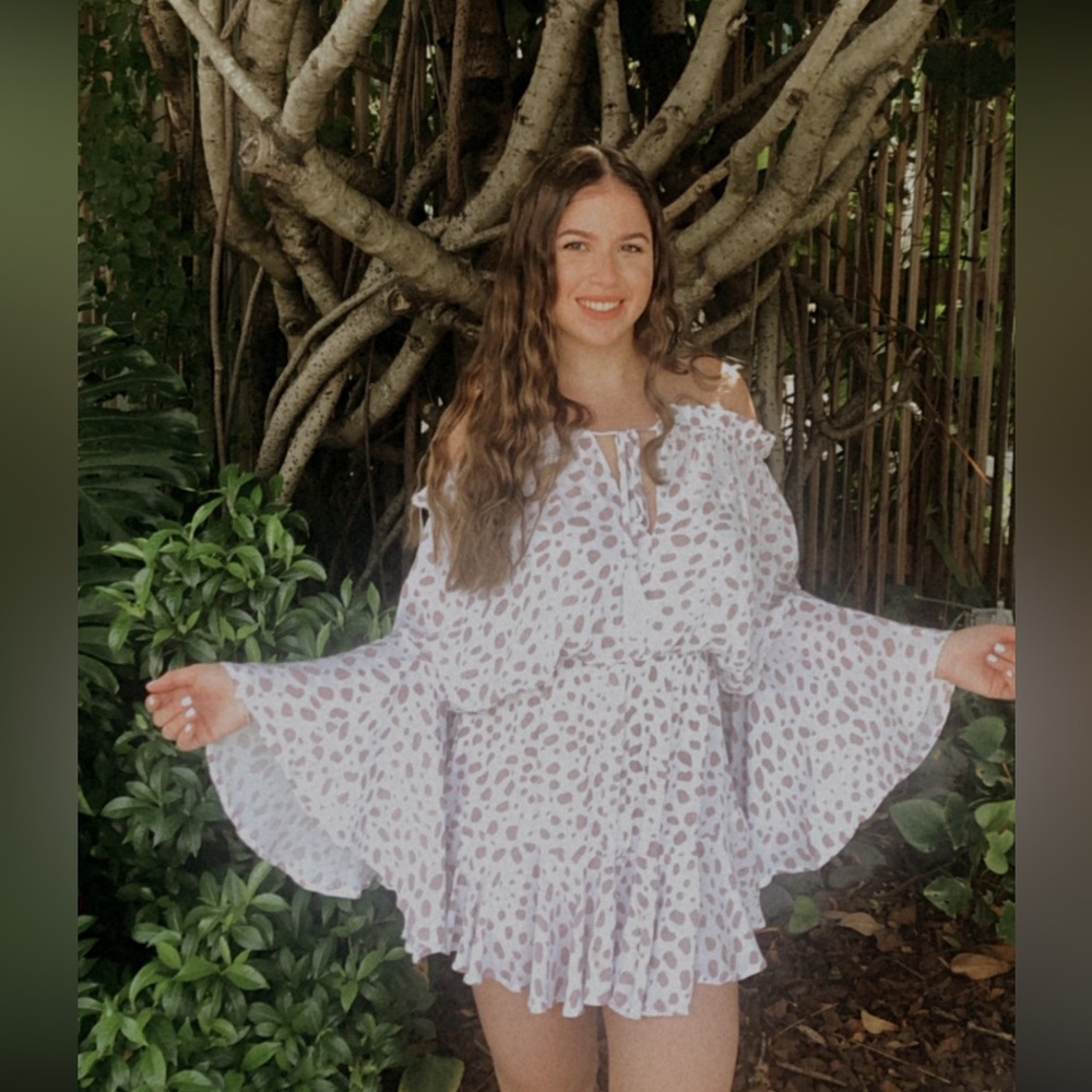 Pink and white floral romper
